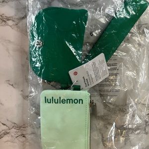 BRAND NEW NEVER USED NEVER OPENED LIMITED COLOR LULULEMON DUAL POUCH WRISTLET